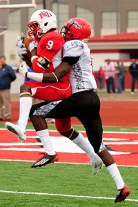 EMCC'S Allen Sentimore (#9) intercepts a pass against Georgia Military Dec. 9.